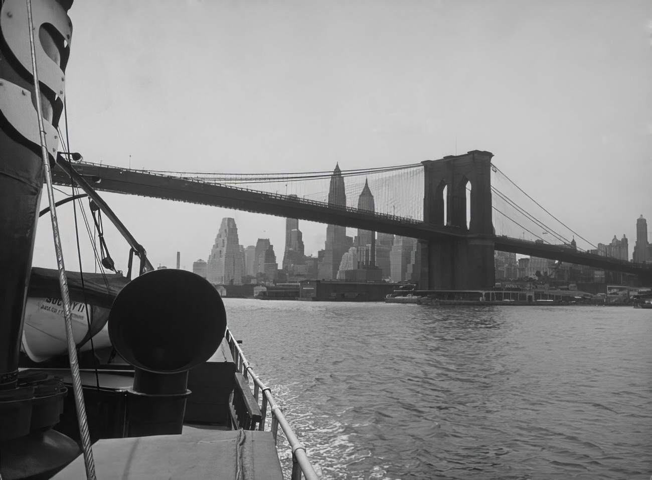 #3 The Brooklyn Bridge and the Lower Manhattan skyline seen from the East River, 1937