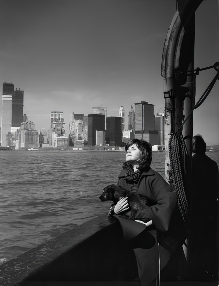 #22 Aboard the Staten Island Ferry with the Twin Towers rising in the background, 1971