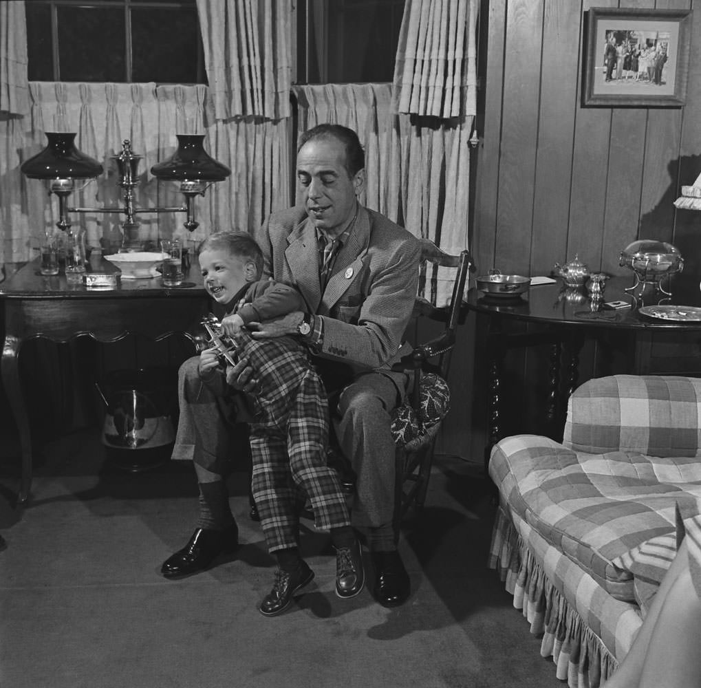 #3 Humphrey Bogart and son Stephen, 1952.