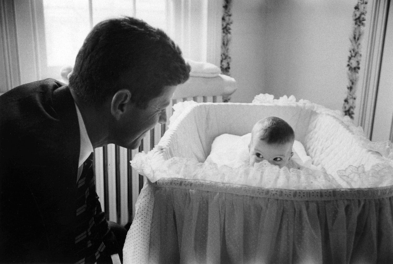 #5 Senator John F. Kennedy with daughter Caroline, 1958.