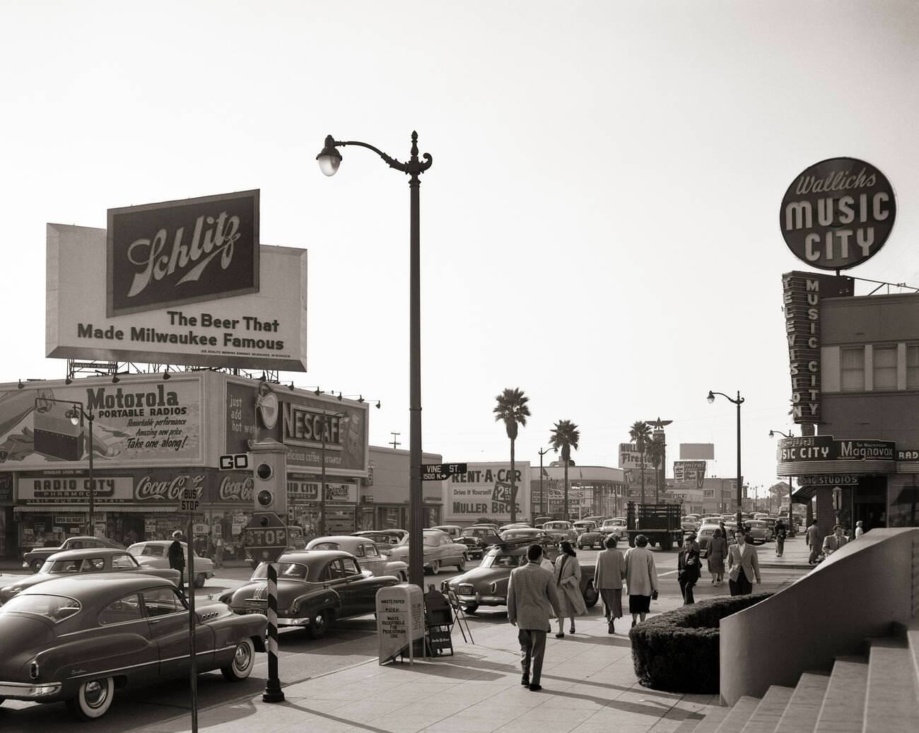 #2 Busy street scene on Sunset Boulevard and Vine Street in Hollywood, California, 1950s.