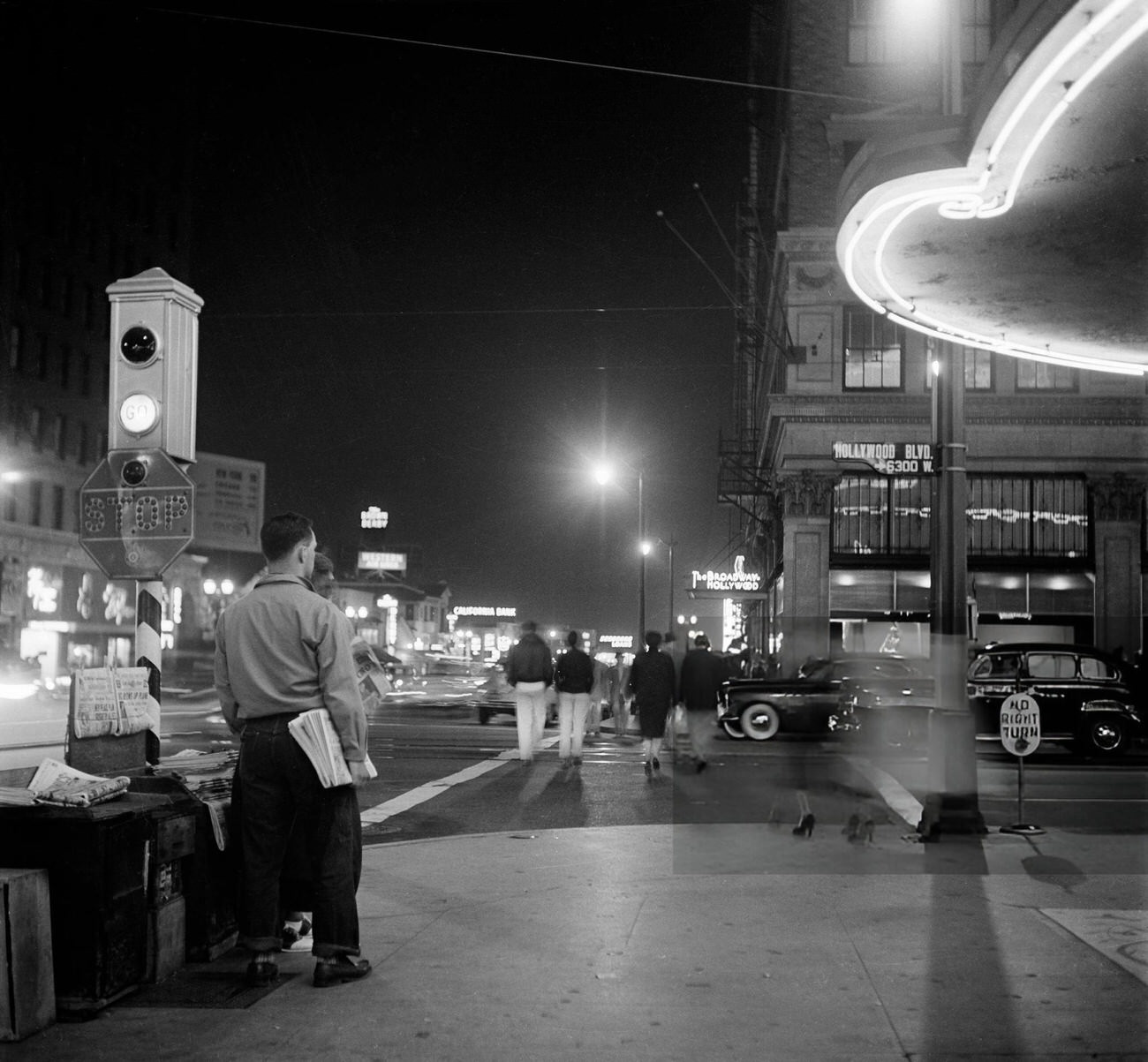 #28 People walking along Hollywood Boulevard in Hollywood, California, 1951.