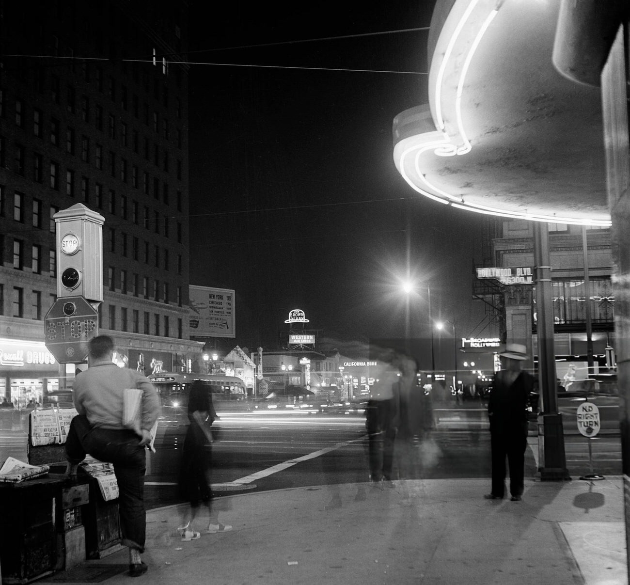 #29 People walking along Hollywood Boulevard in Hollywood, California, 1951.