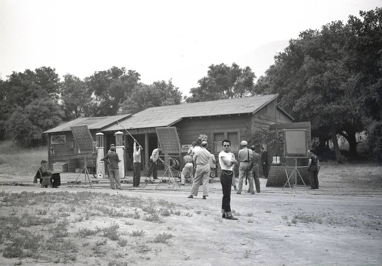 #5 A Hollywood film set showing a small rural gas station, 1950s.