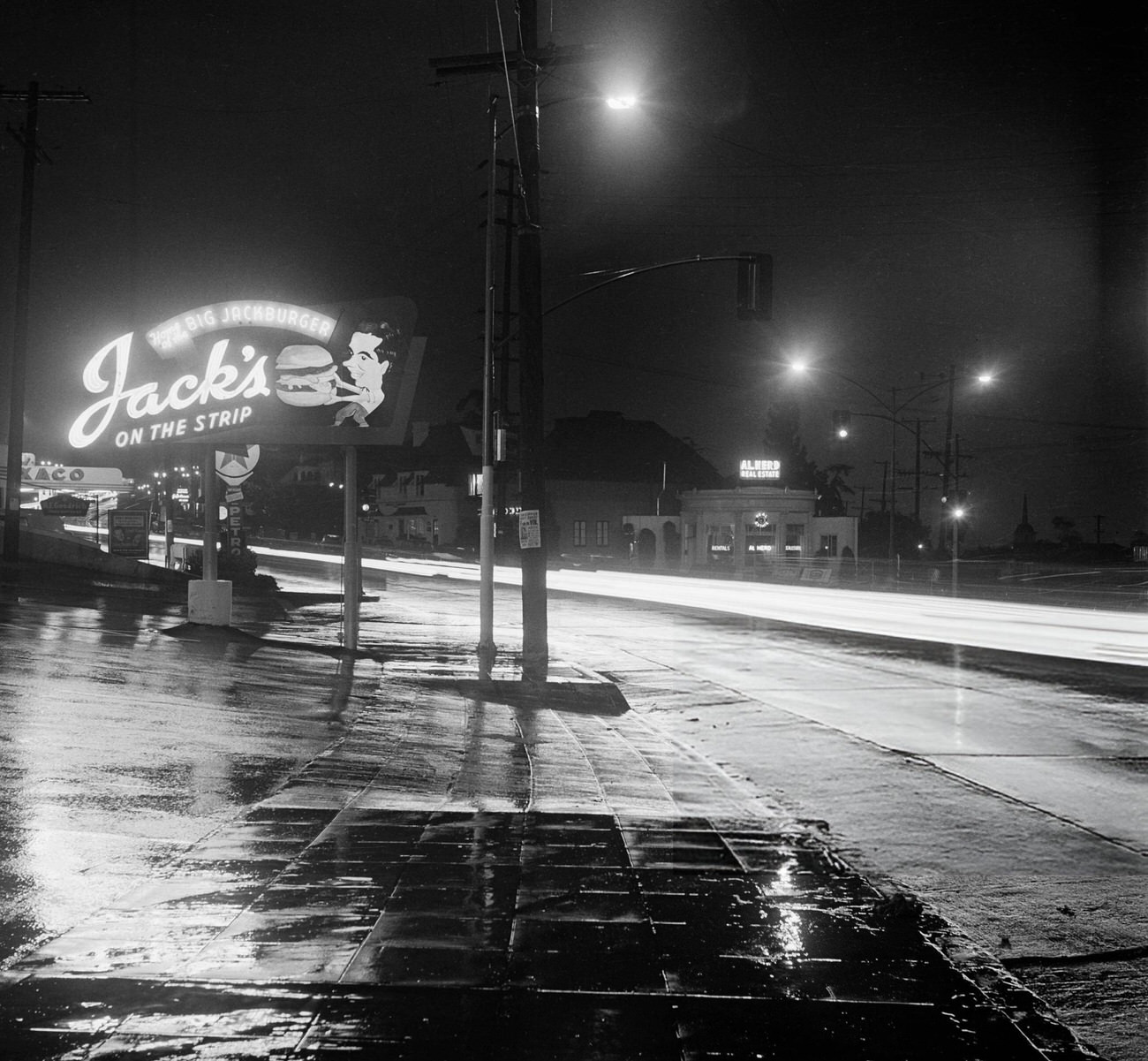 #38 Jacks Hamburger sign on Sunset Boulevard in Hollywood, California, 1950s.
