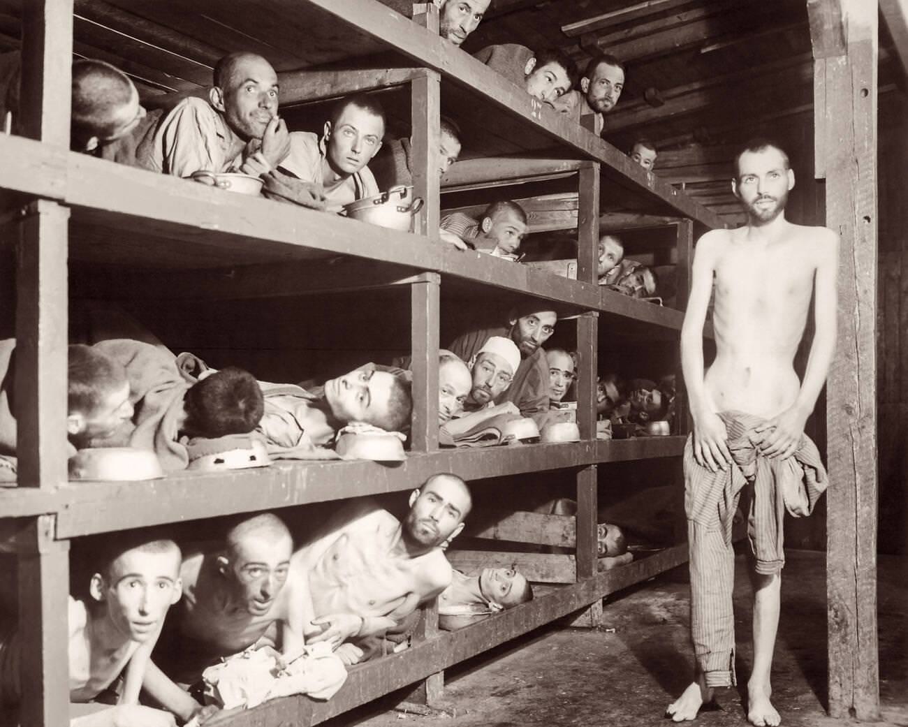 #9 Buchenwald Concentration Camp, 1945. Elie Wiesel, who later received the Nobel Peace Prize in 1986, is the 7th person from the left on the 2nd row from the bottom.