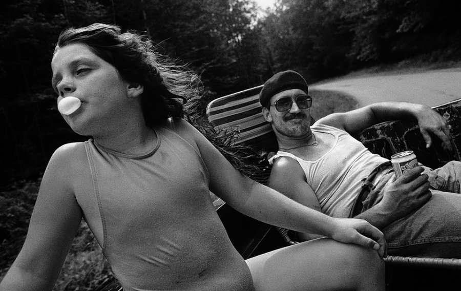 #10 Liza and Uncle Kendall on the way to the swimming hole, 1990