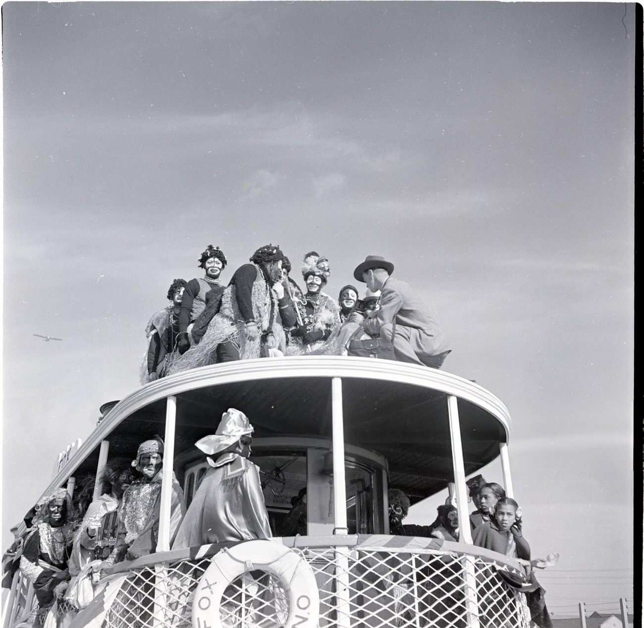 #22 Men on a Ferry for a Mardi Gras Event, Dressed as African Tribesman, 1950s.
