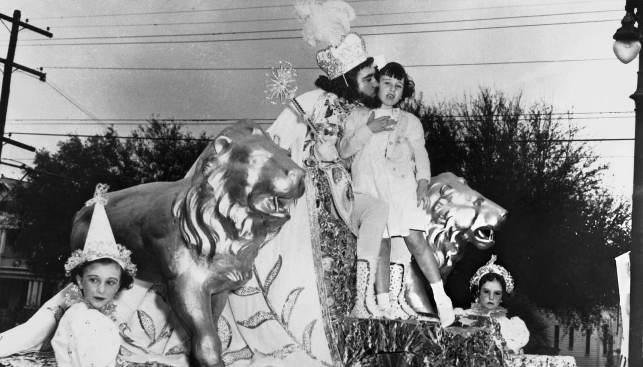 #50 King Mid-City XV Kisses Valerie Combe After Receiving the Keys to New Orleans From the Six-Year-Old of the Sacred Heart Orphanage During Mardi Gras Week, 1952.