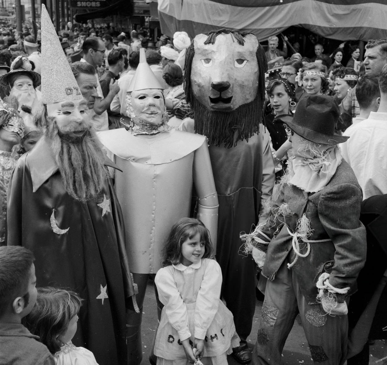 #52 A Group Arrives at the New Orleans Mardi Gras Dressed as Characters From ‘The Wizard of Oz’, 1950s.