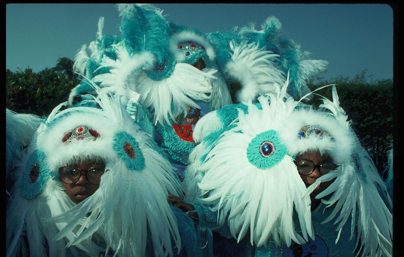 #62 Young Boys Wear Ornate, White Feather Headdresses at a Mardi Gras Indian Celebration, New Orleans, 1960s.