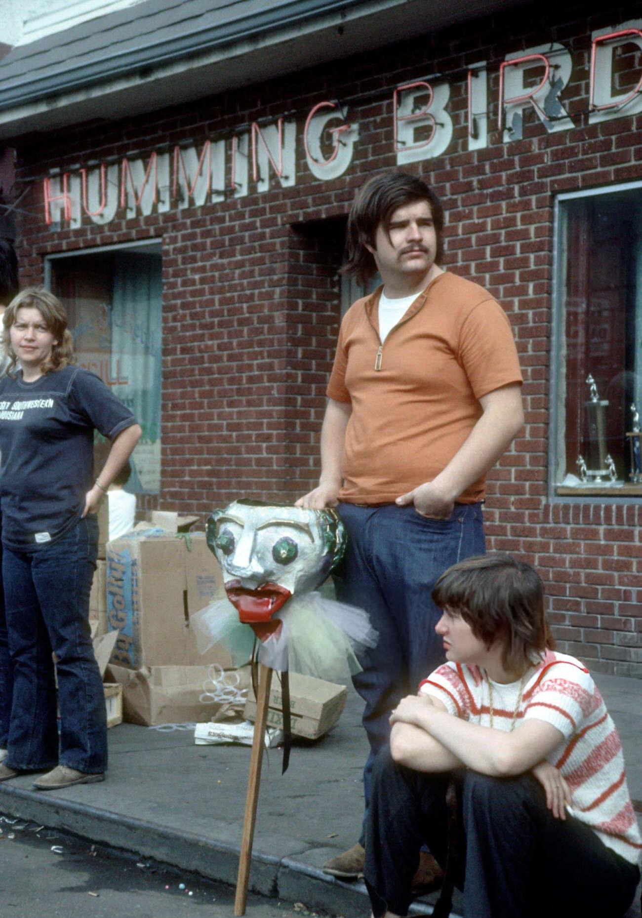 #76 People Watch From the Curb During the Mardi Gras Parade, 1973.