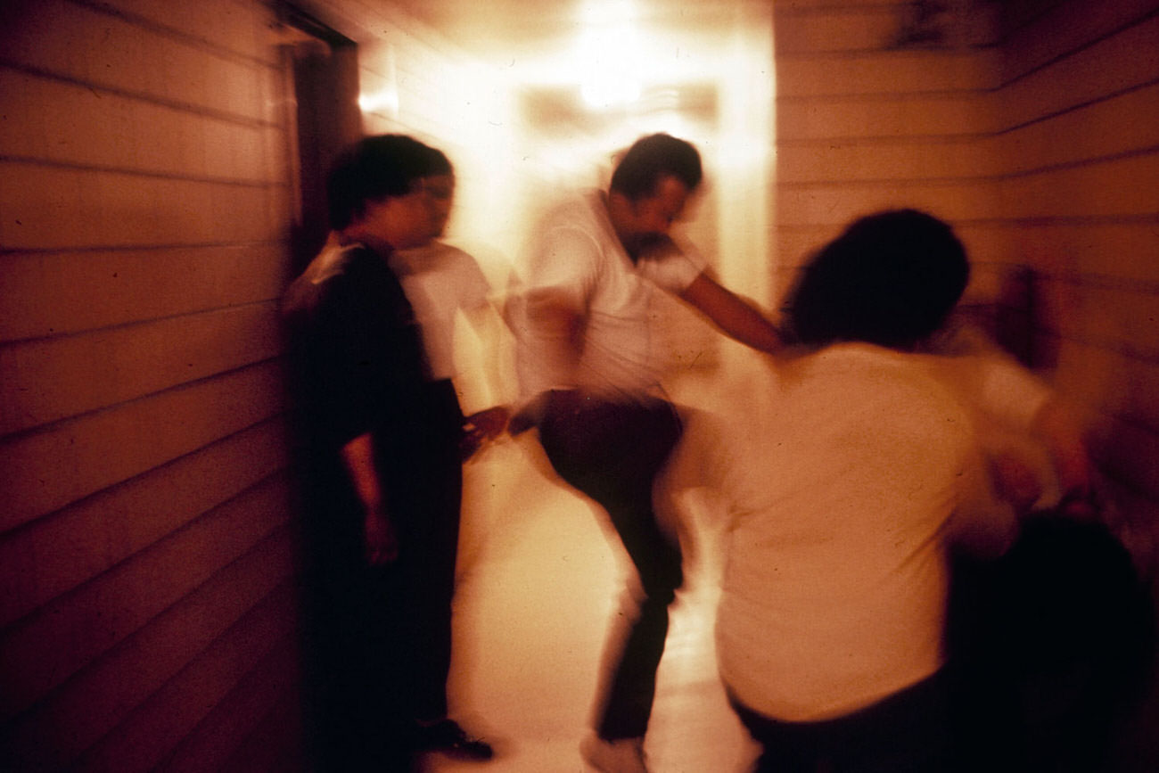 #7 In an apartment building corridor, members of the Reapers administer their own swift and brutal justice to a junkie accused of having stolen a Reaper’s car.