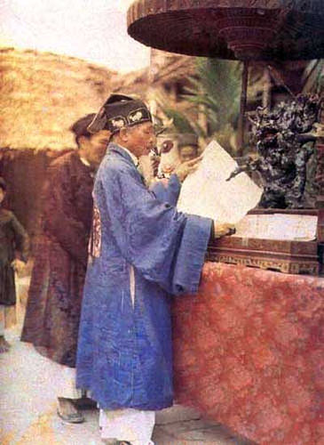 #5 A district chief reading a patent Imperial, 1916