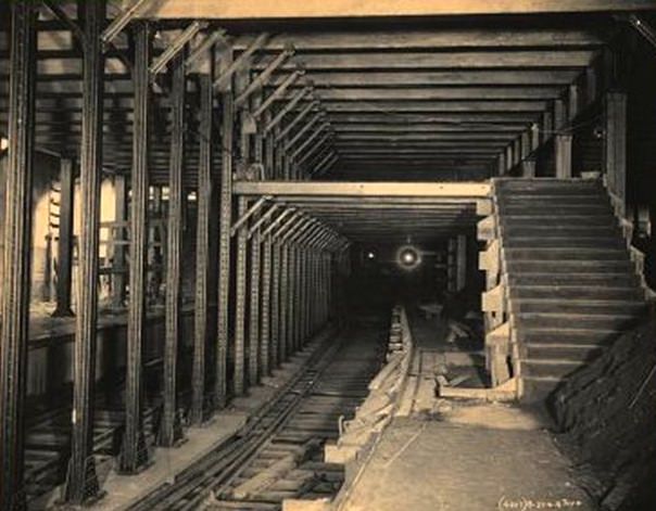 #1 Subway Construction: 14th Street & 4th Avenue Pillars and tracks; stairs down to platform. October 1903.