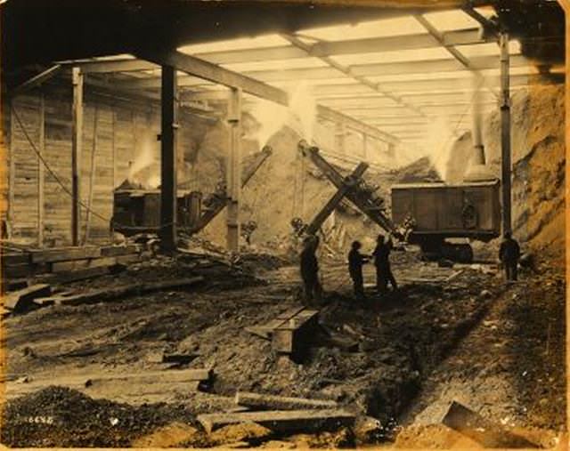 #7 Independent Subway Construction: Interior of above structure. Workers and cranes. January 1931.