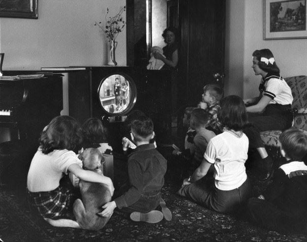 #14 Grade school kids in Minneapolis watch a video “classroom lesson” on TV while the city’s public schools are on strike in 1951