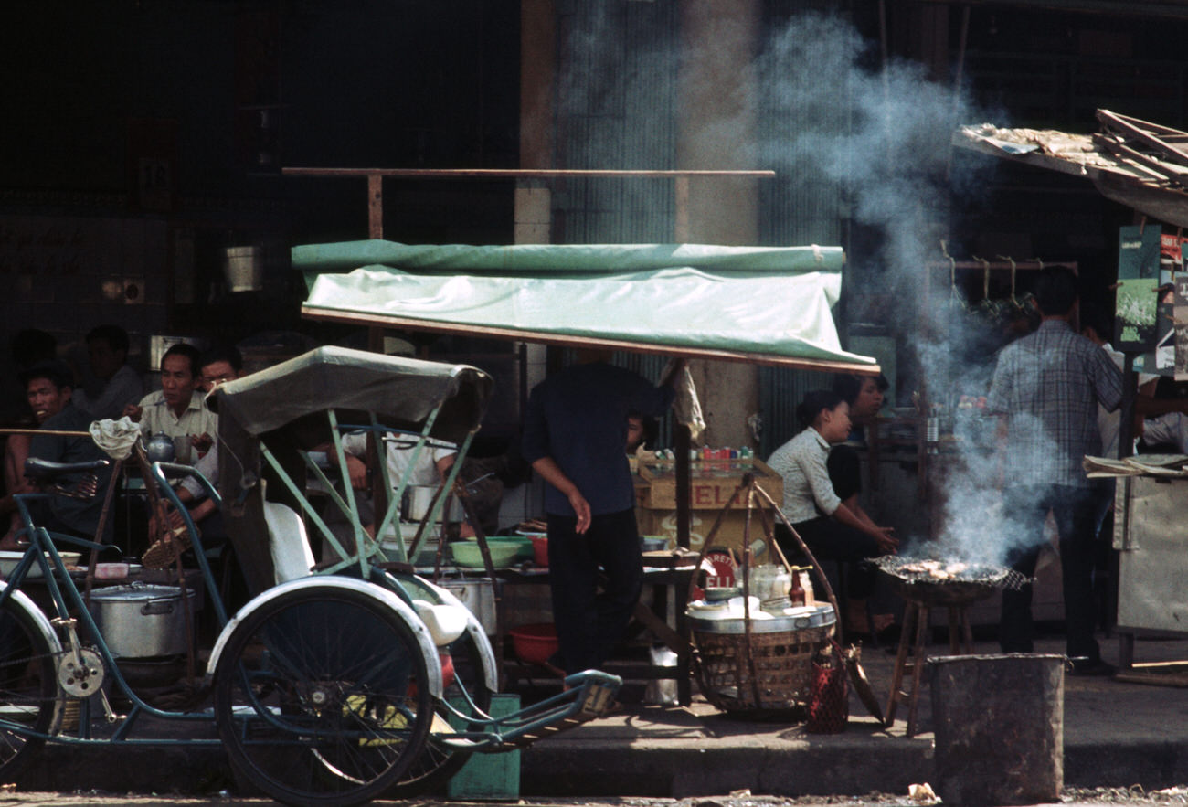 #121 A food stand at the Saigon Docks, 1968.