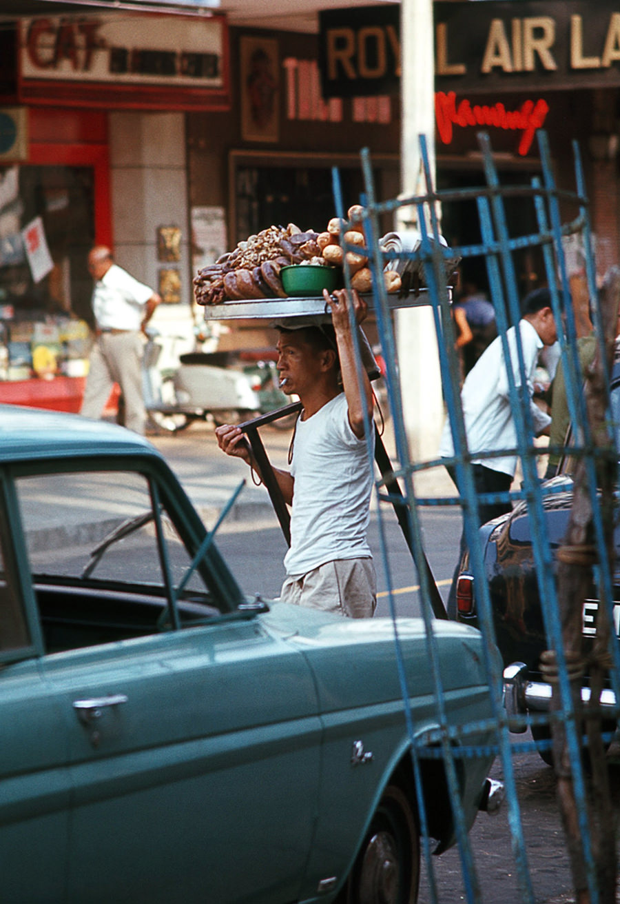 #97 A pastry vendor on Tu Do Street in Saigon, 1968.