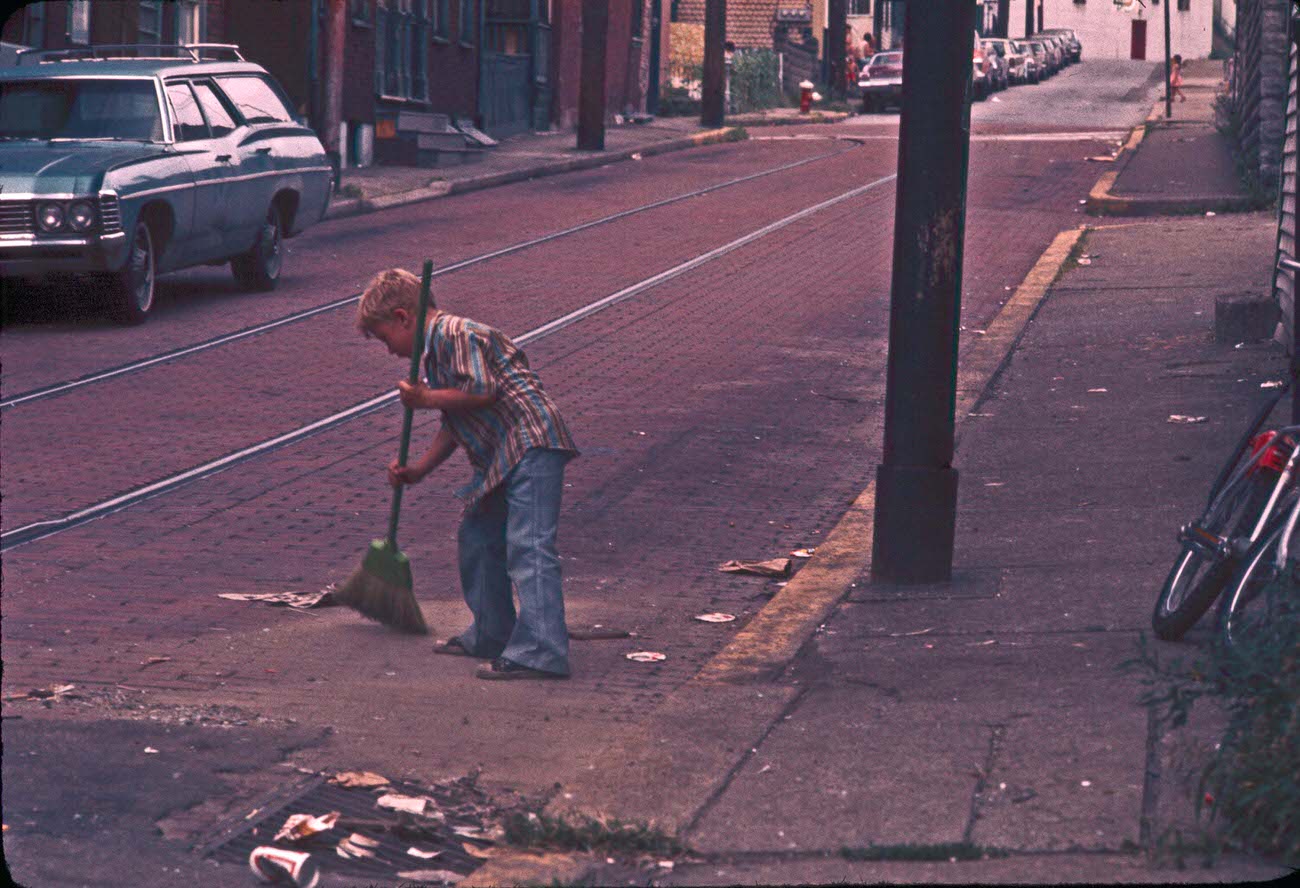 #17 Boy sweeping, 1970s.