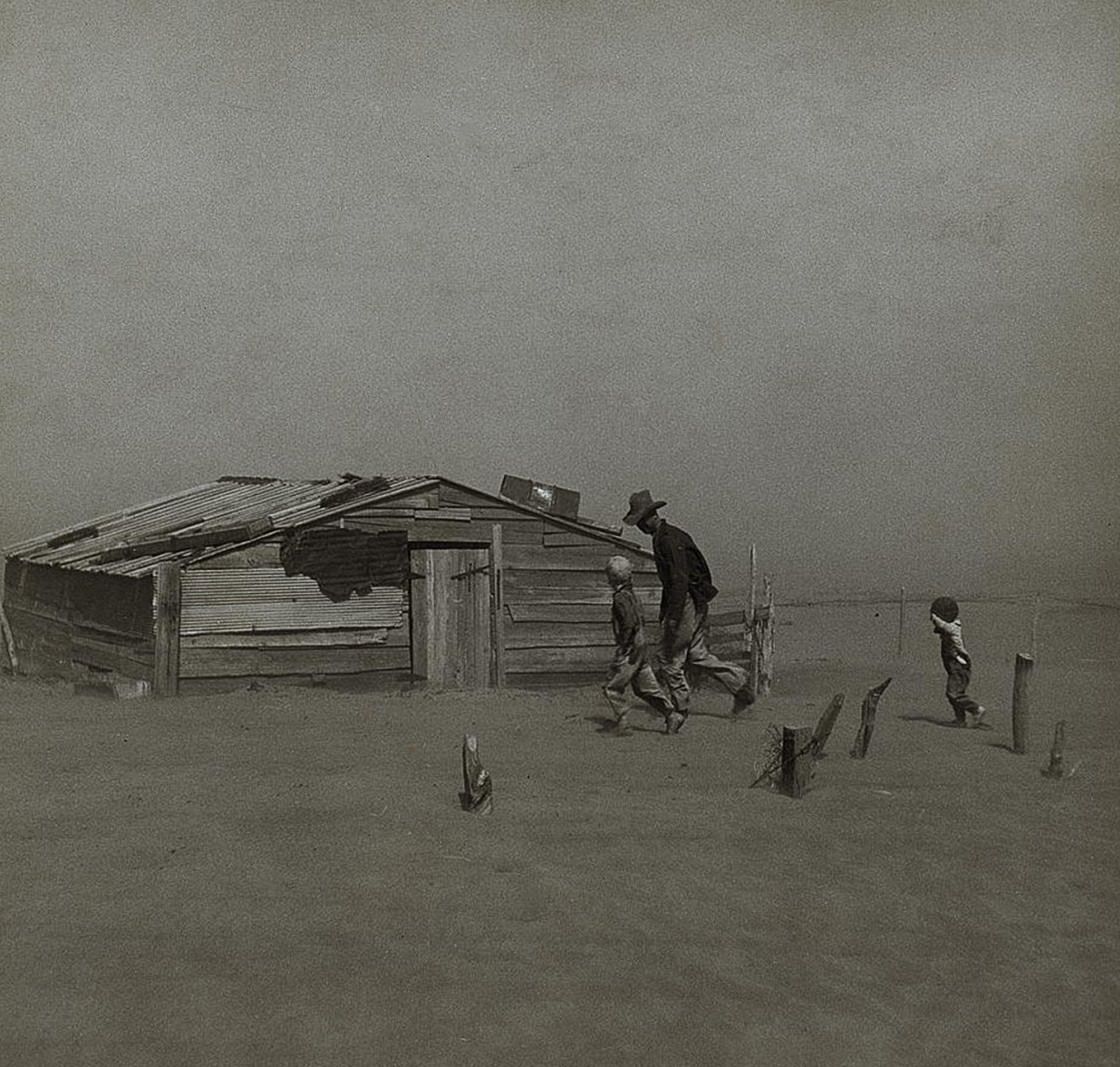 #23 Farmers and sons walking during a dust storm in Cimarron County, Oklahoma, 1936.