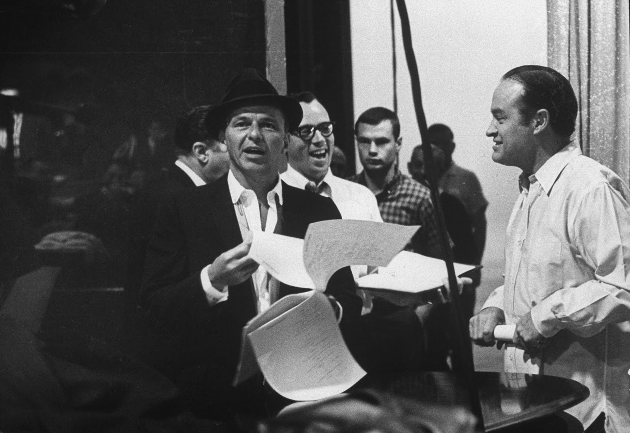 #22 Bob Hope (right) and Frank Sinatra rehearse for The Bob Hope Show, 1962.