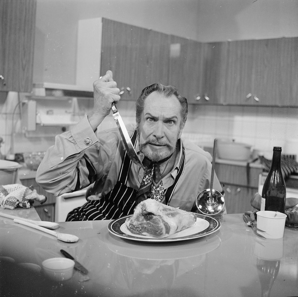 #11 Vincent Price murdering a piece of meat.At Thames TV studios in London, 1970.