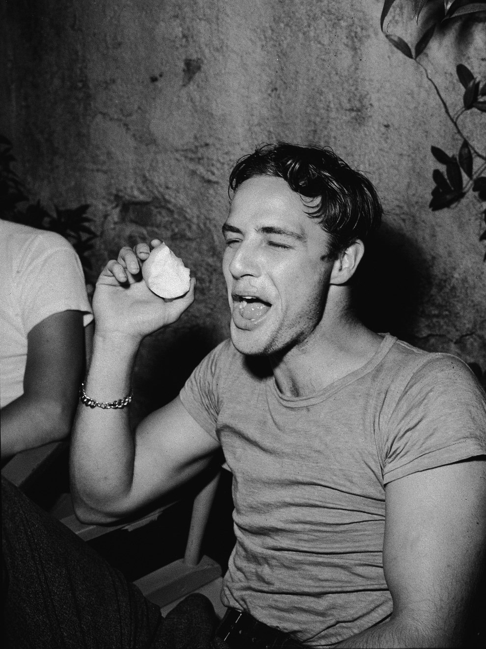 #18 Marlon Brando having fun with an apple. During a break on the set of ‘A Streetcar Named Desire,’ 1951.