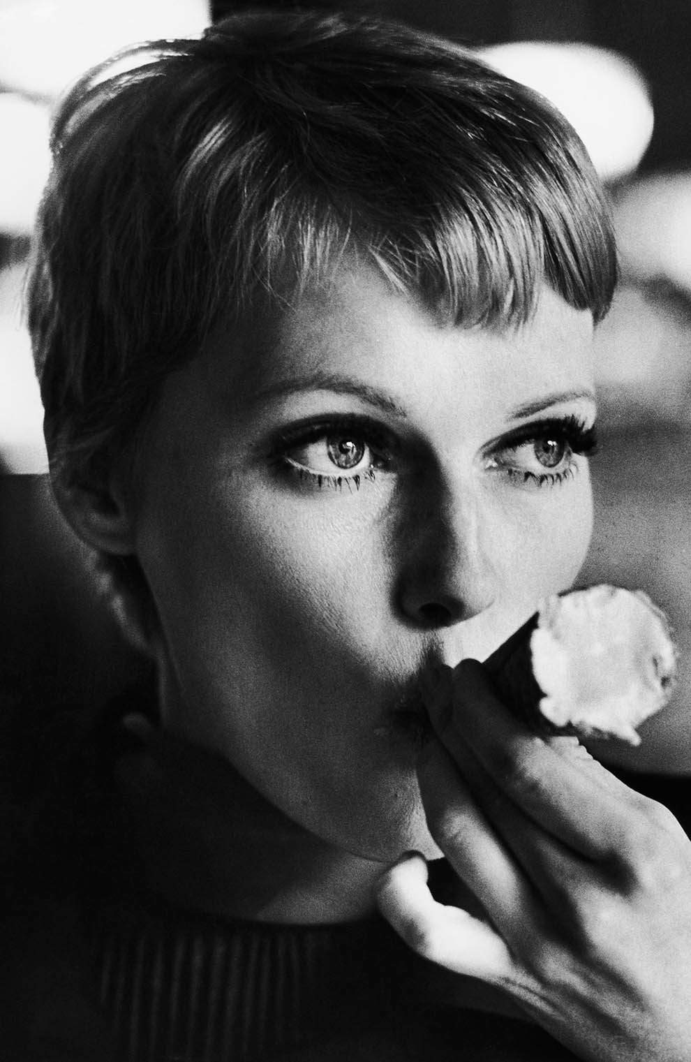 #2 Mia Farrow getting a grip on her ice cream cone, 1977.
