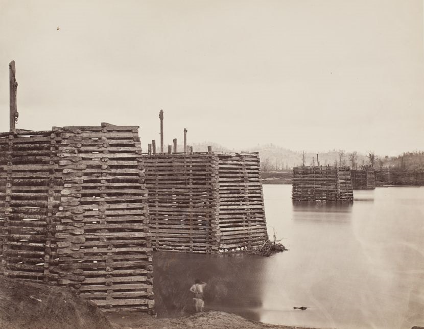 #45 Wooden piers of a wagon bridge across the Tennessee River at Chattanooga (looking north), 1865