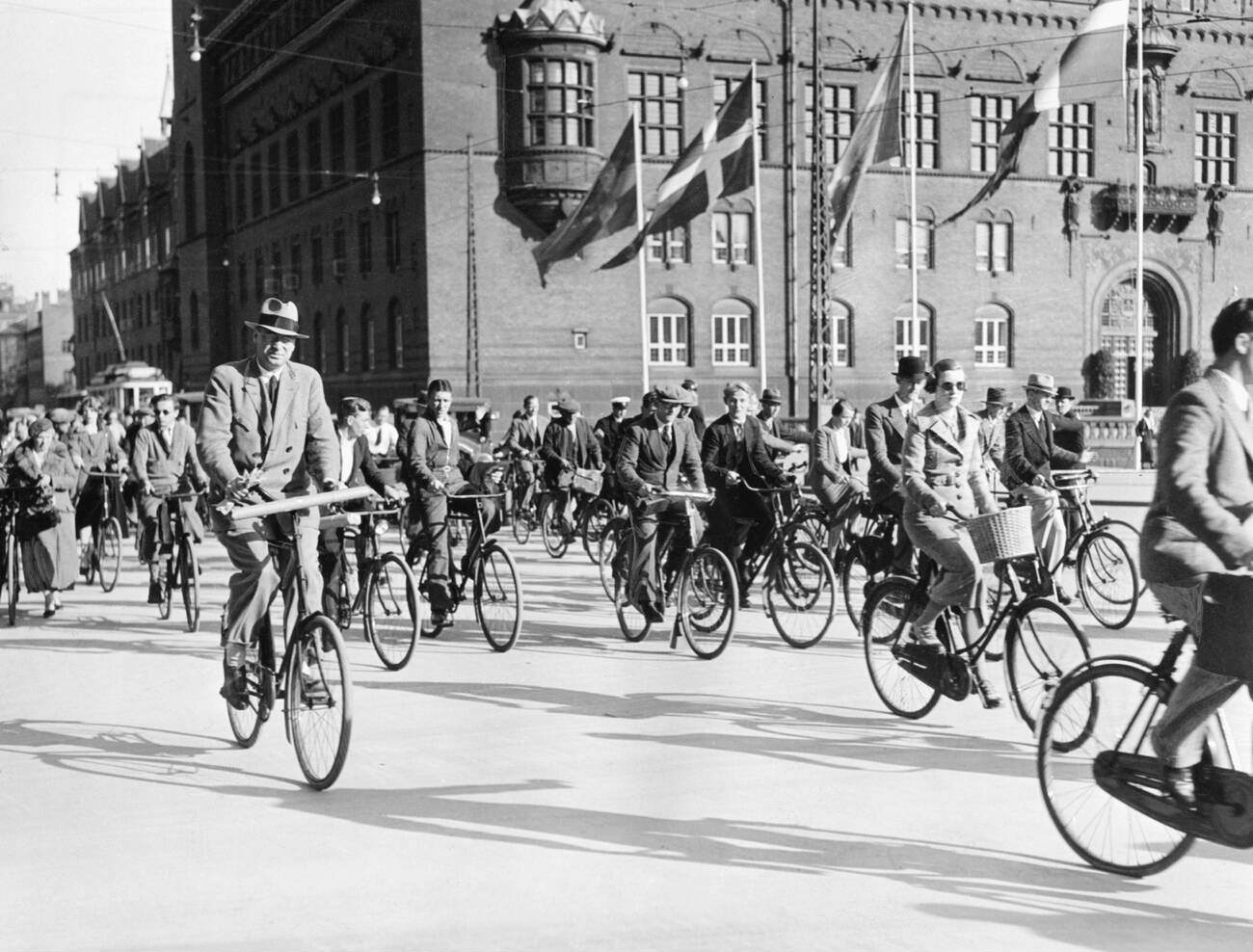 #14 Cyclists at Copenhagen’s Town Hall Square, 1930s