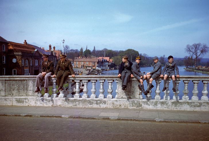 #1 Troops and civilians pass the time on the River Thames in the spring of 1944