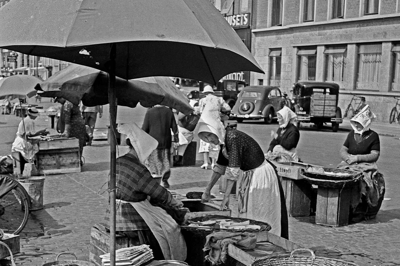 #69 Women selling fish in a traditional costume, Copenhagen, Denmark, 1930s