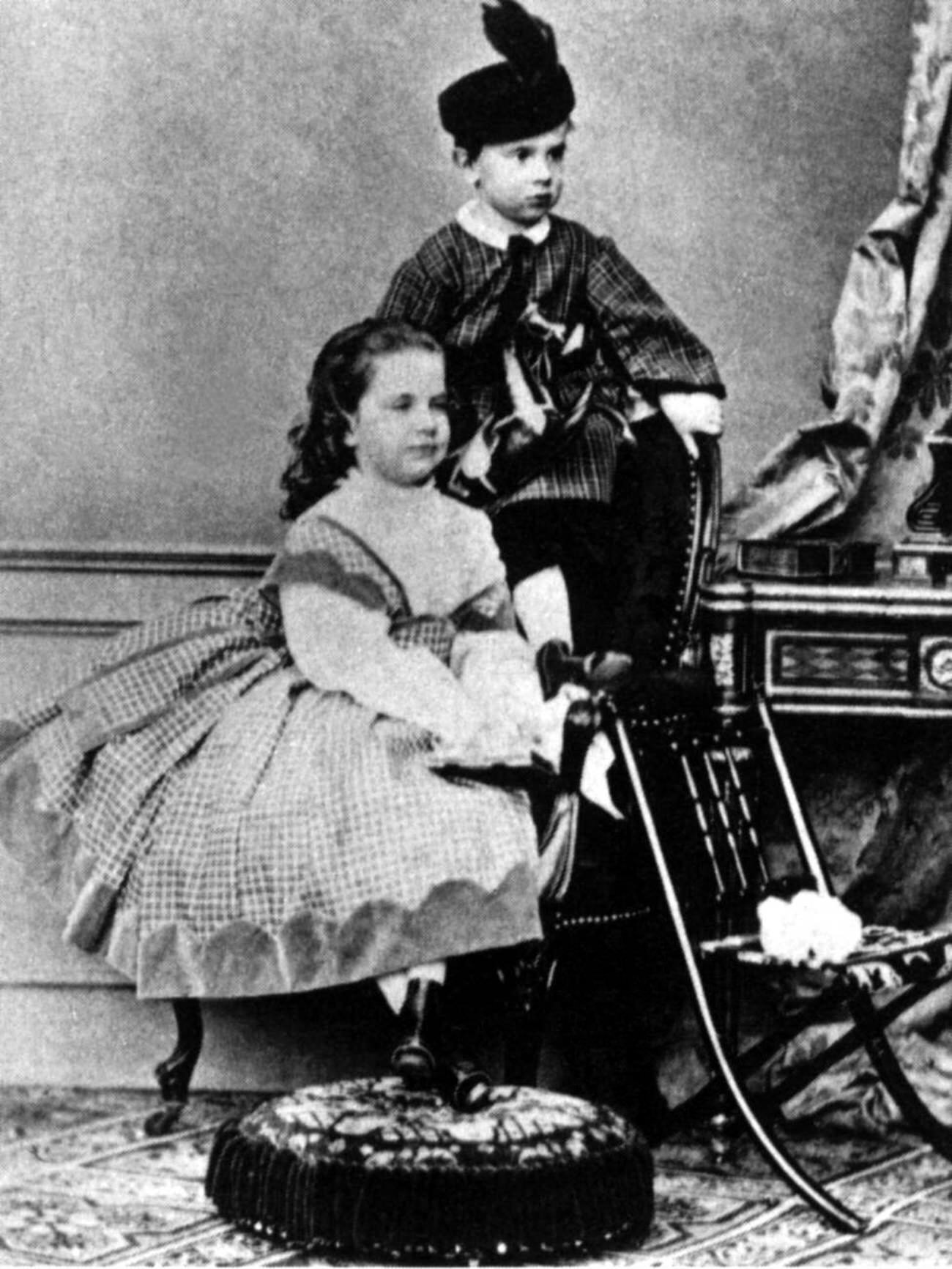 #8 Crown Prince Rudolf of Austria with his sister Princess Gisela, 1862.