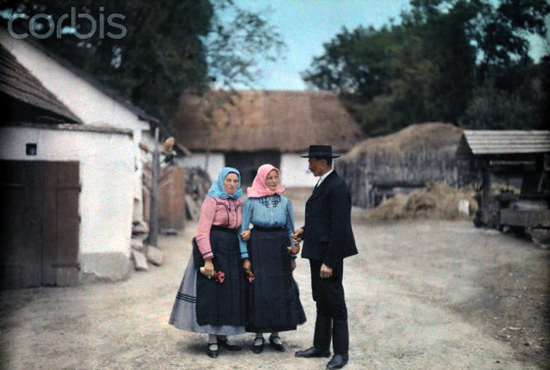 #6 People in folk costume visit in a Hungarian village, January 1930.