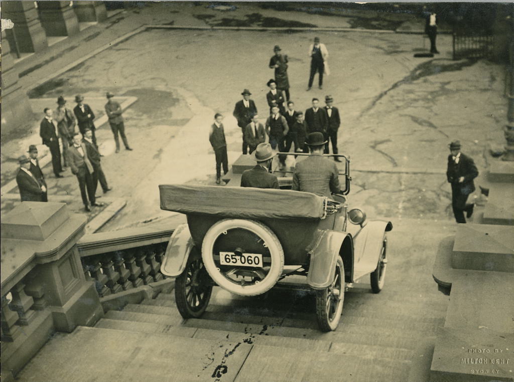 Overland car being driven down steps of Sydney Town Hall, 1920 – 1929