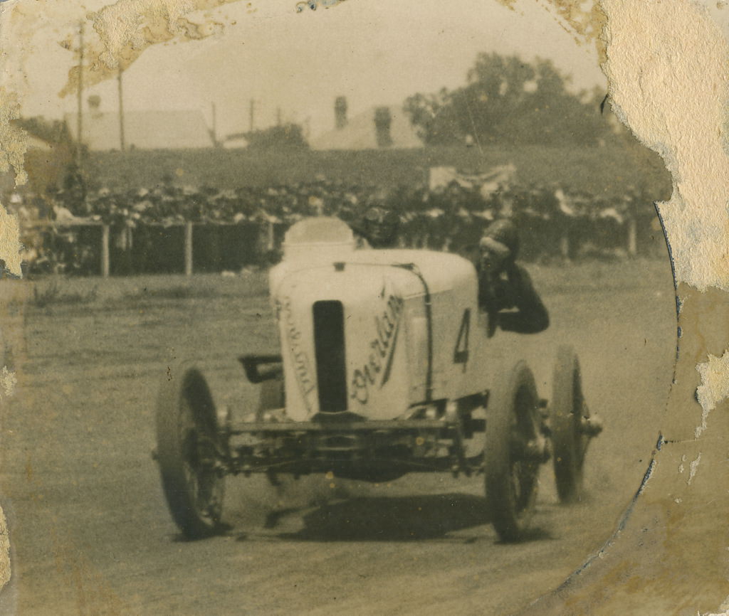 Don Harkness at the wheel of his Overland Sports car Whitey at race meeting, 1920 – 1929
