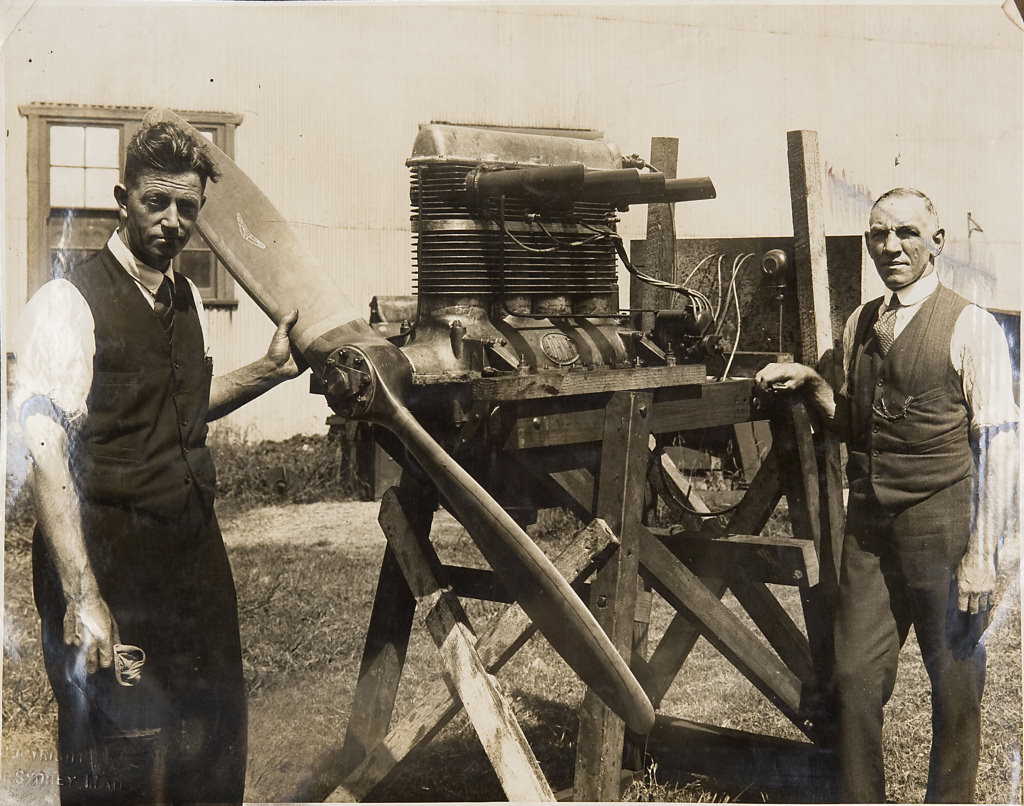 Don Harkness and unidentifed man with hydroglider engine, 1923 – 1933