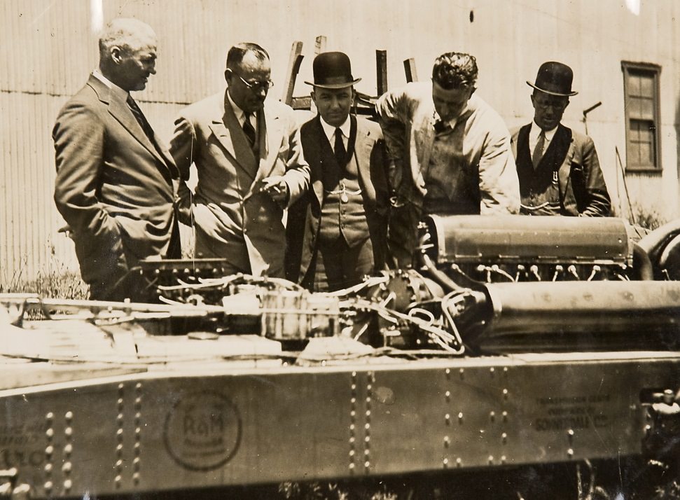 Men inspecting the car F.H. Stewart Enterprise, 1926 – 1936