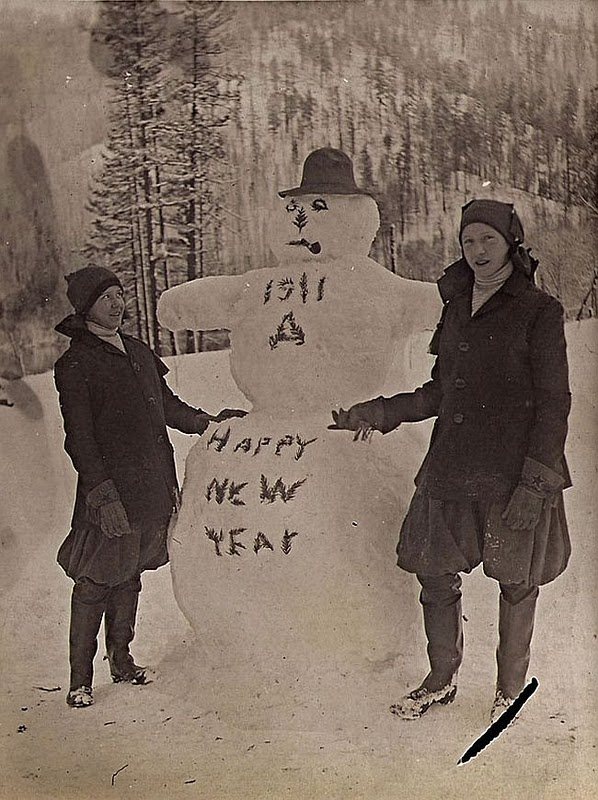 #23 Two children with a snowman, greeting the New Year, 1911.