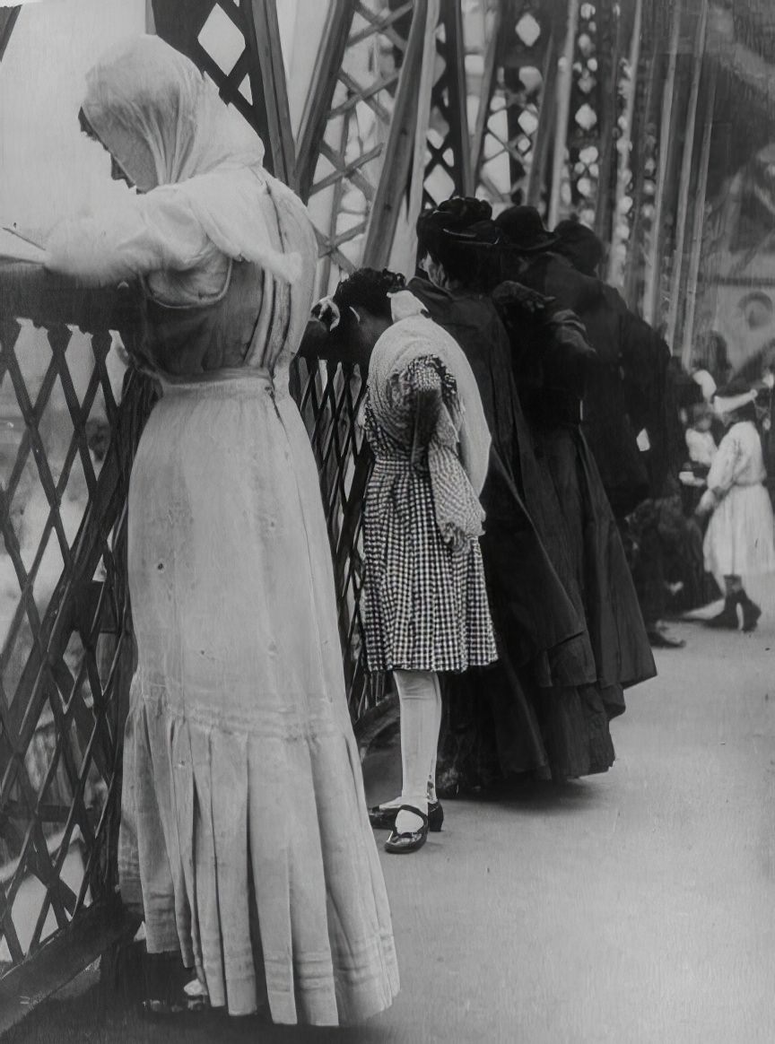 #26 Jewish women praying on the Williamsburg Bridge, New York City, on New Year’s Day, 1909.