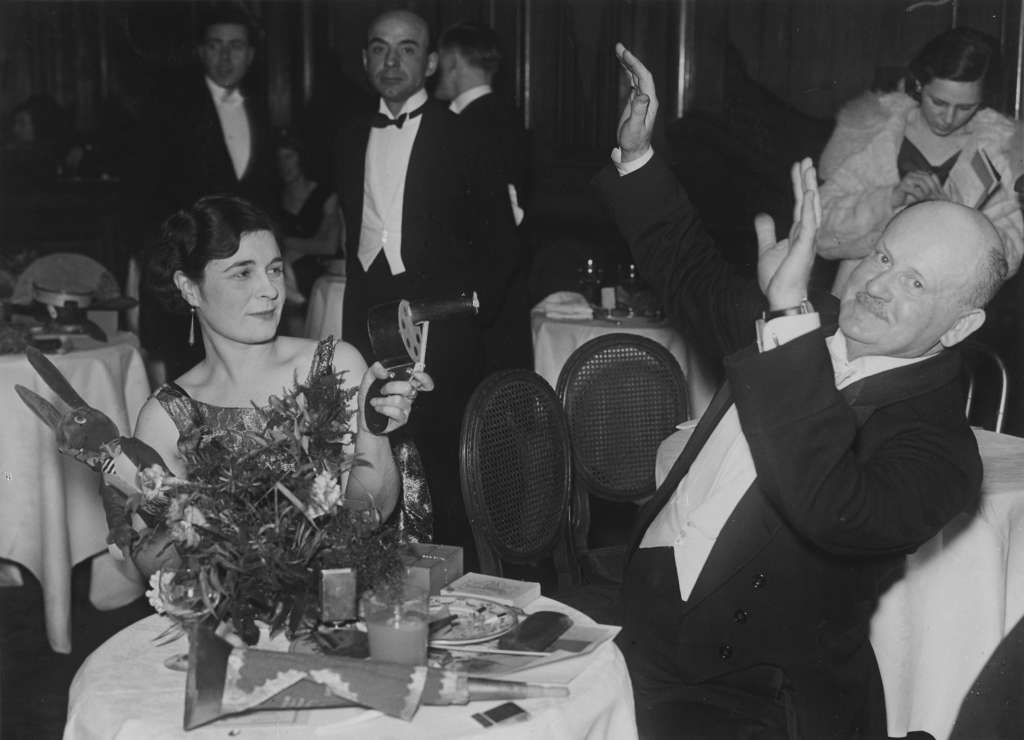 #39 Revelers celebrating New Year’s Eve at the Piccadilly Restaurant, London, 1931.