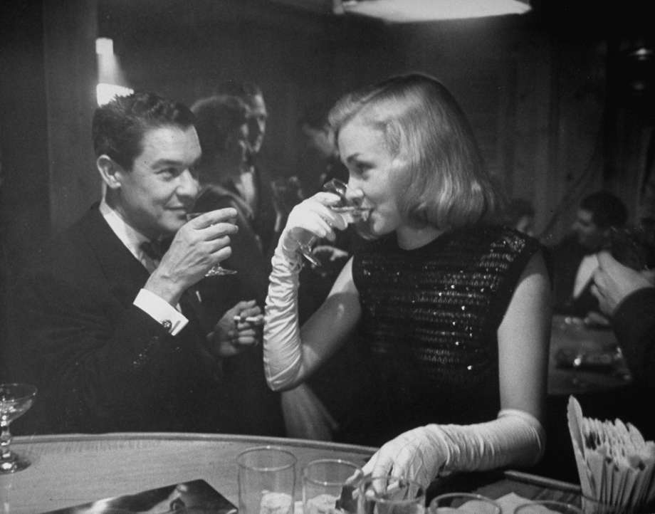 #60 Nina Foch and Jean Louis at Samuel Spiegle’s New Year’s Eve party, 1949.