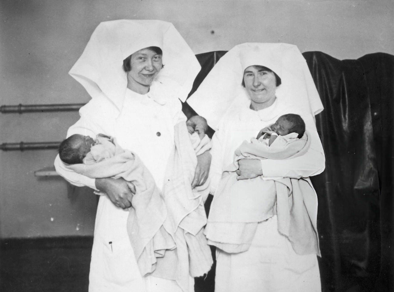 #36 Nurses with newborn babies at the City of London Maternity Home, 1929.