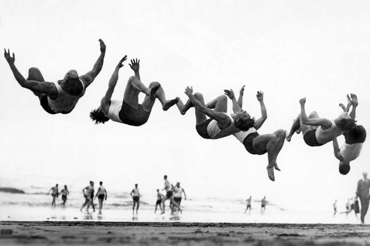 #55 Members of the Olympic Club jumping into the Pacific Ocean, 1932.