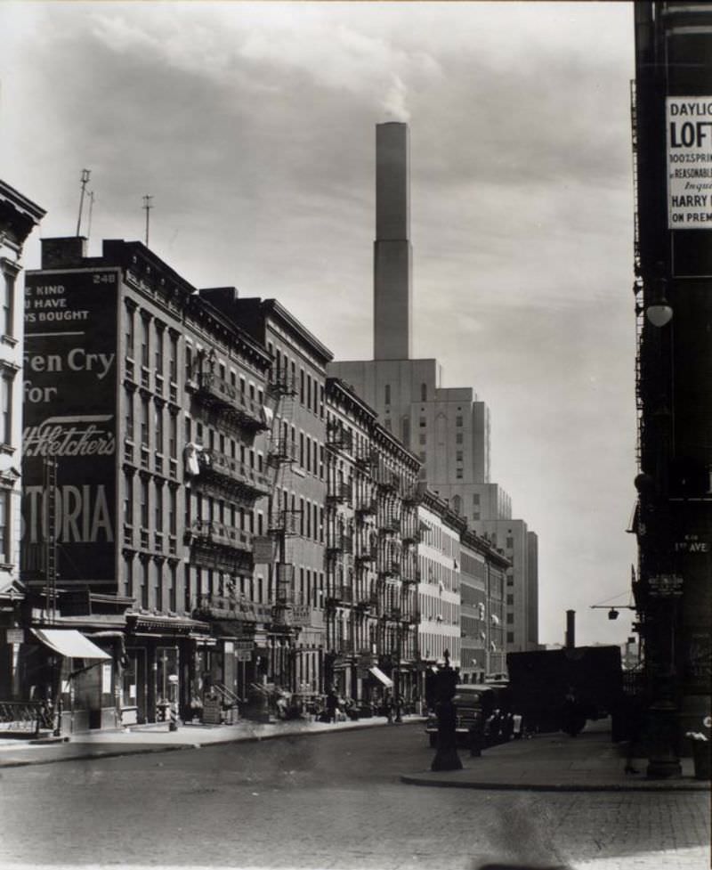 #4 First Avenue and East 70th Street, Manhattan. Looking east (?) toward New York Hospital (?), apartments, lofts, businesses on 70th in the foreground.