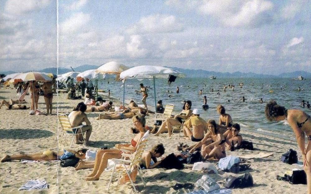 #5 The beach in Wonsan is filled with tourists, most like from the USSR, in this 1980s snap that was included in a brochure given to prospective visitors.