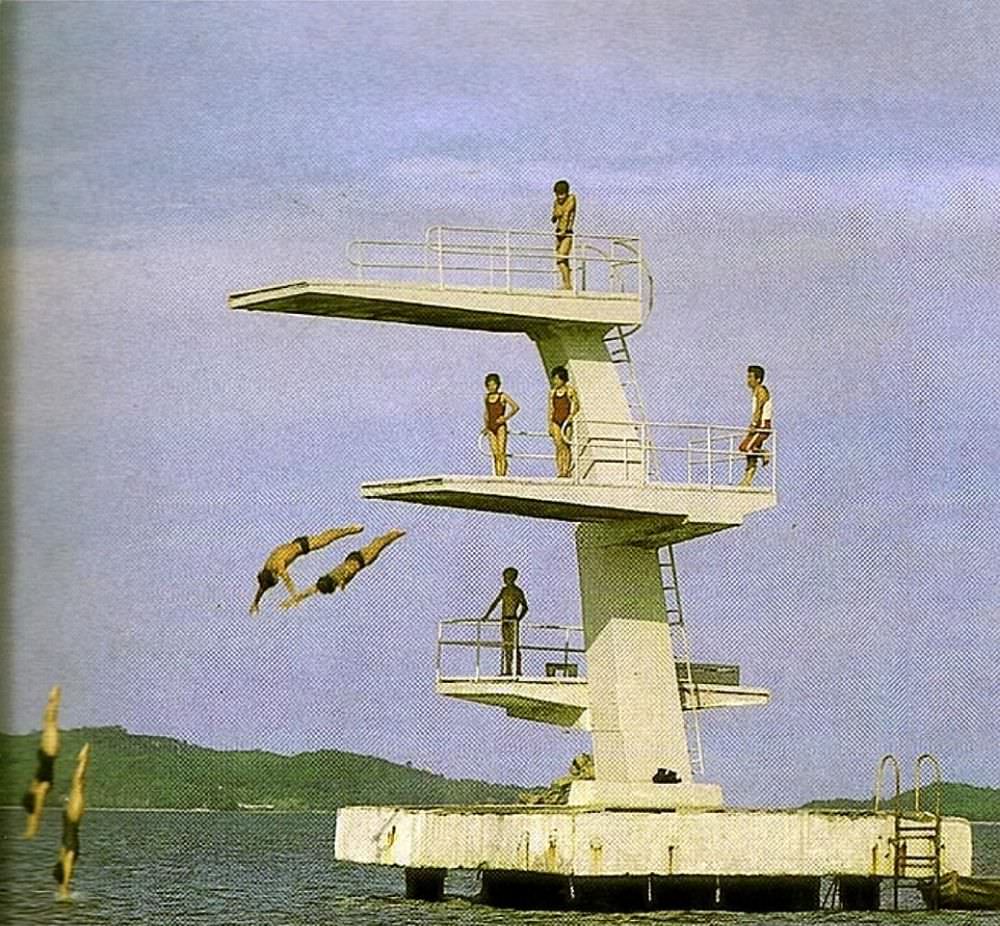 #8 People enjoying a diving platform in the city of Wonsan. Tourism was and is an important source of income for North Korea, as well as helping spread its propaganda.