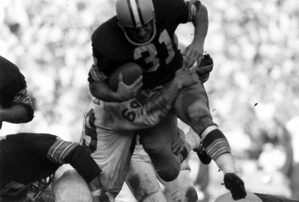 Jim Taylor tackled by the Chiefs’ Sherrill Headrick, Super Bowl I, 1967