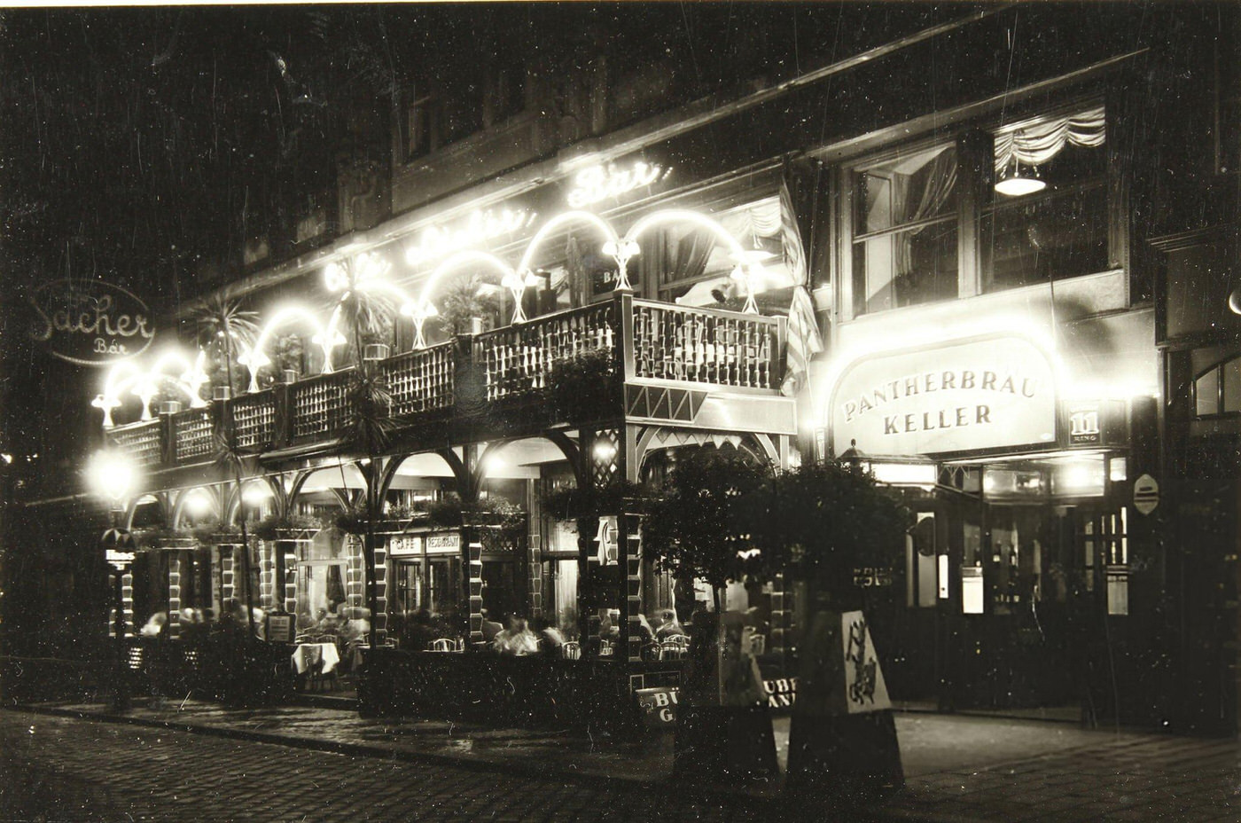 #100 Café Sacher at night, Vienna, 1930.